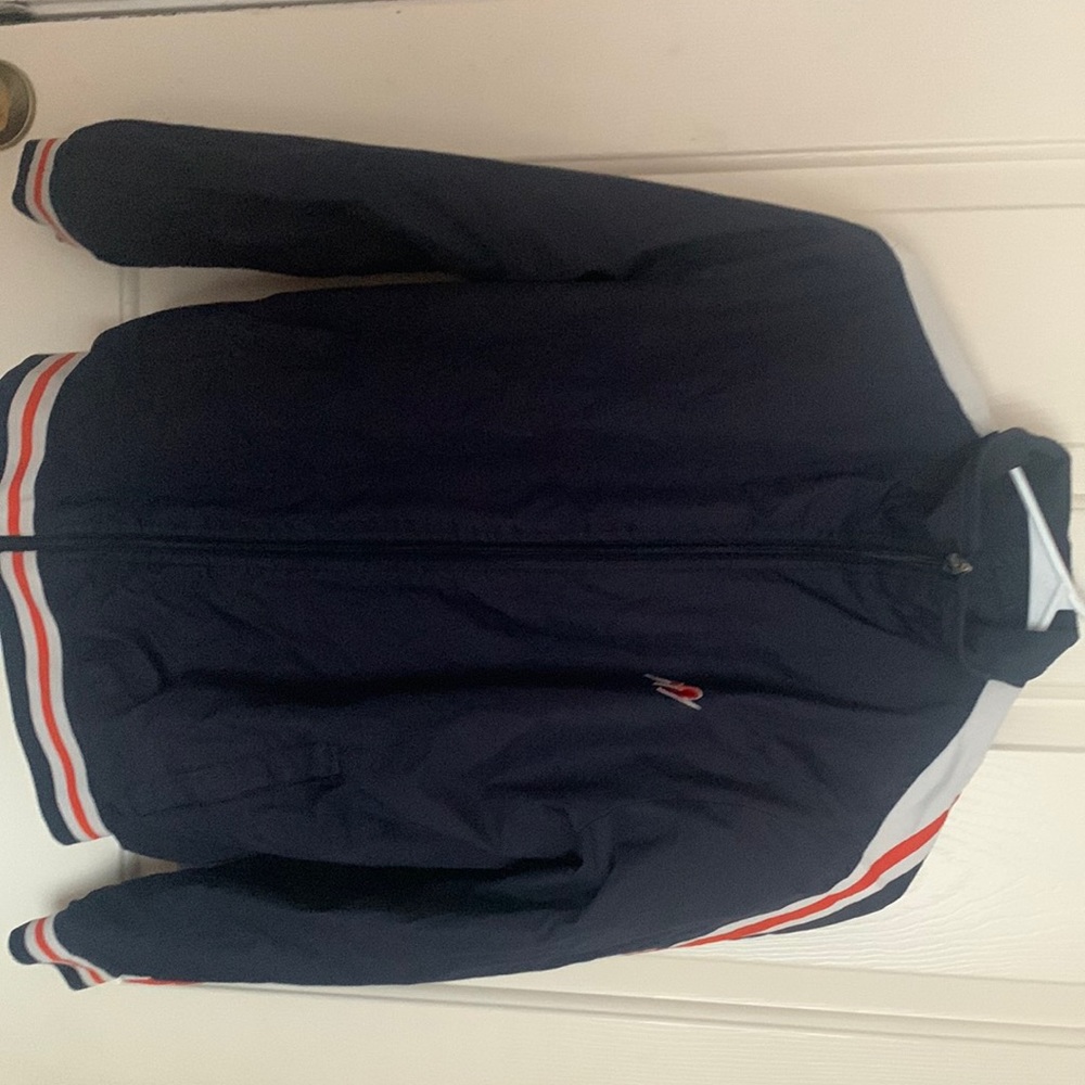 Blue jacket red stripes